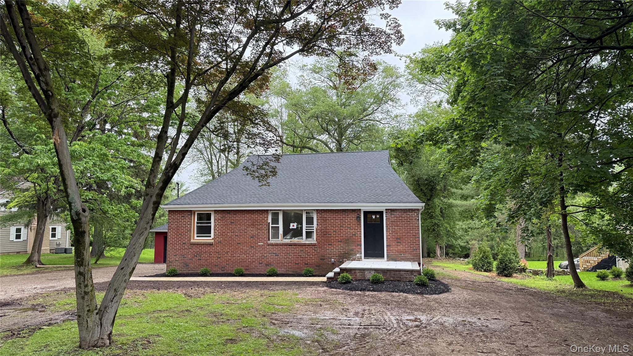 20 Pineview Road West Nyack, NY 10994 - Photo 3 of 36 a front view of a house with a yard
