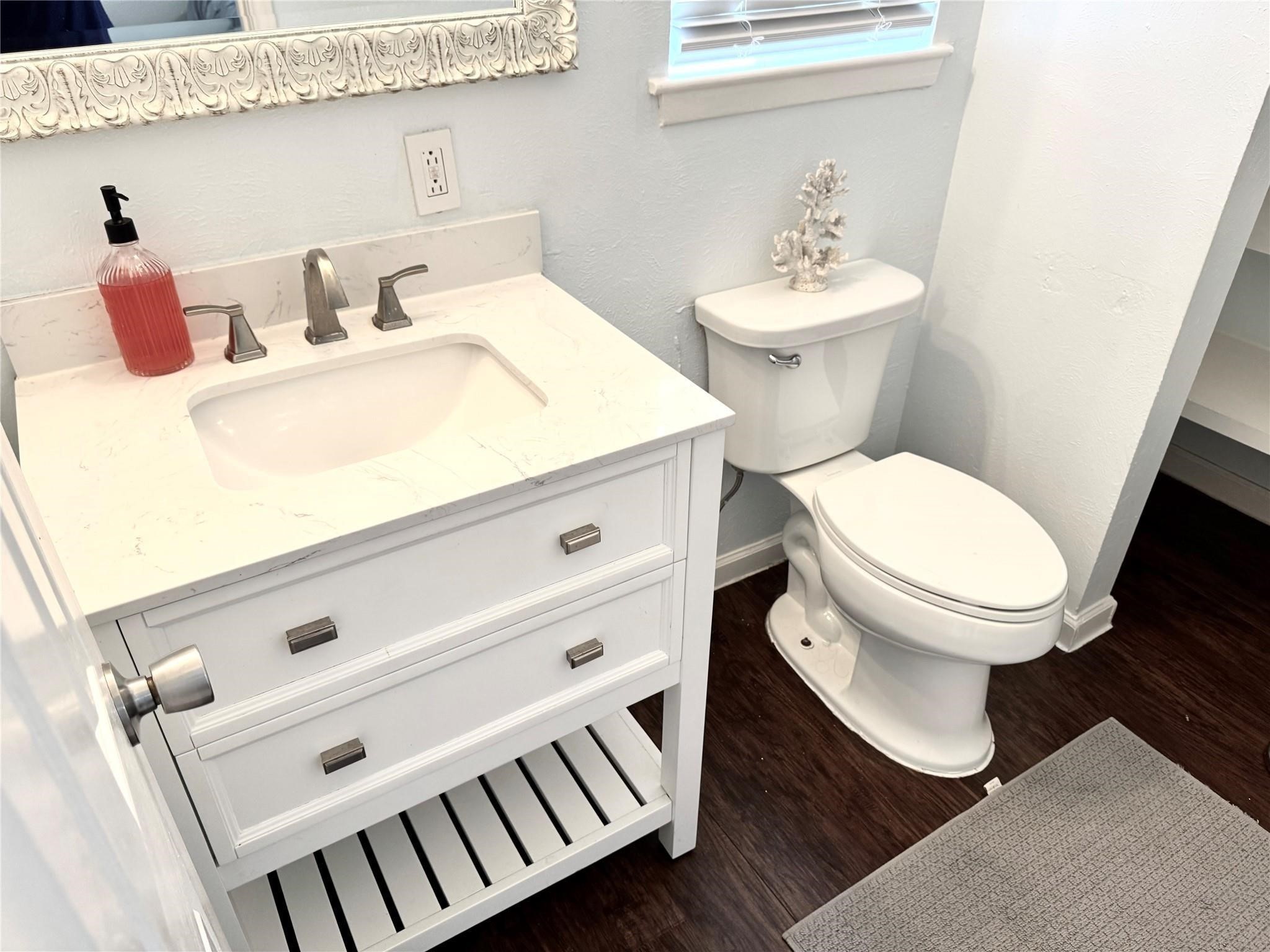 11311 Caribbean Lane Houston, TX 77089 - Photo 11 of 21 a bathroom with a sink and a toilet