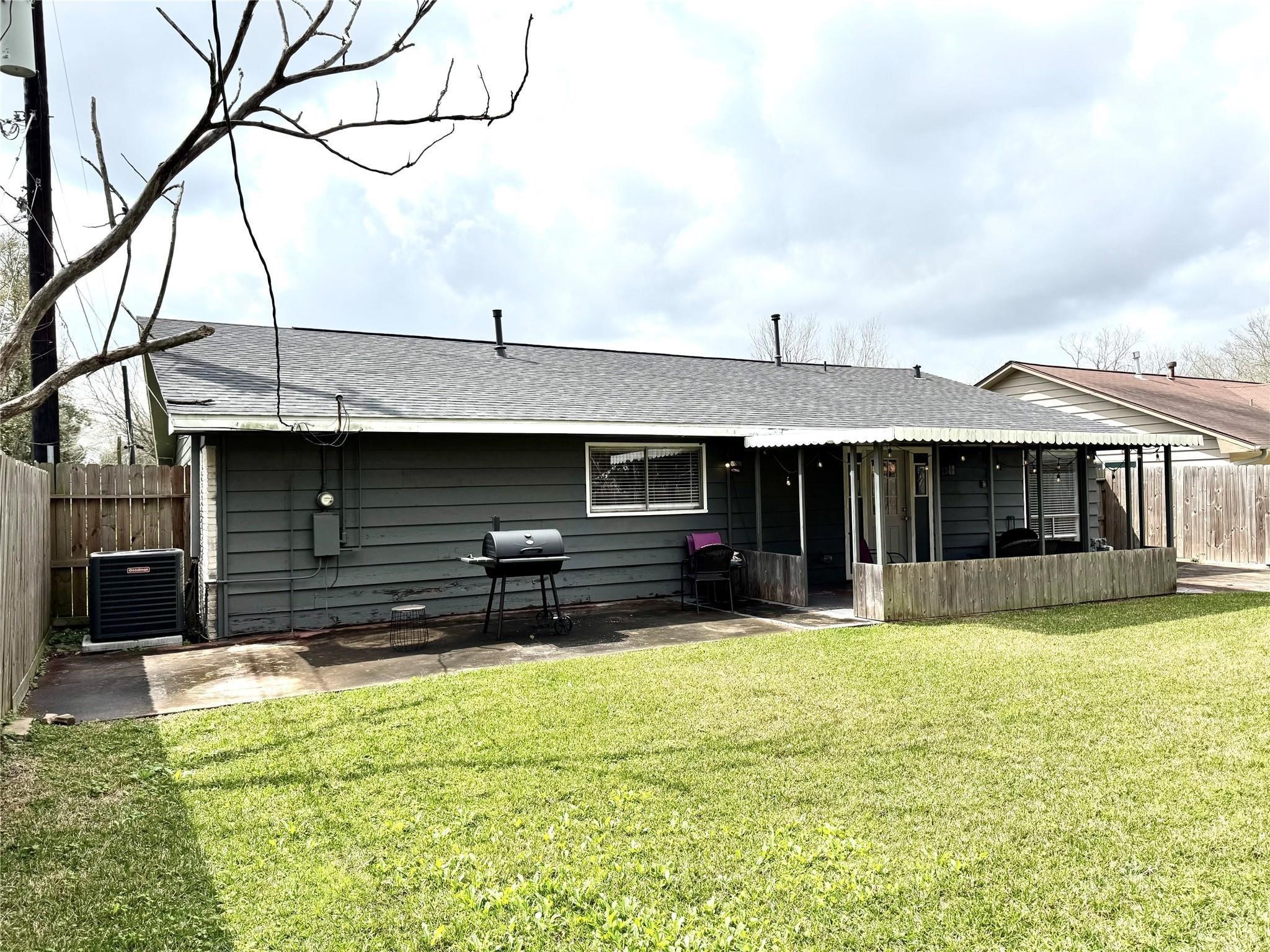 11311 Caribbean Lane Houston, TX 77089 - Photo 19 of 21 a view of a house with a yard