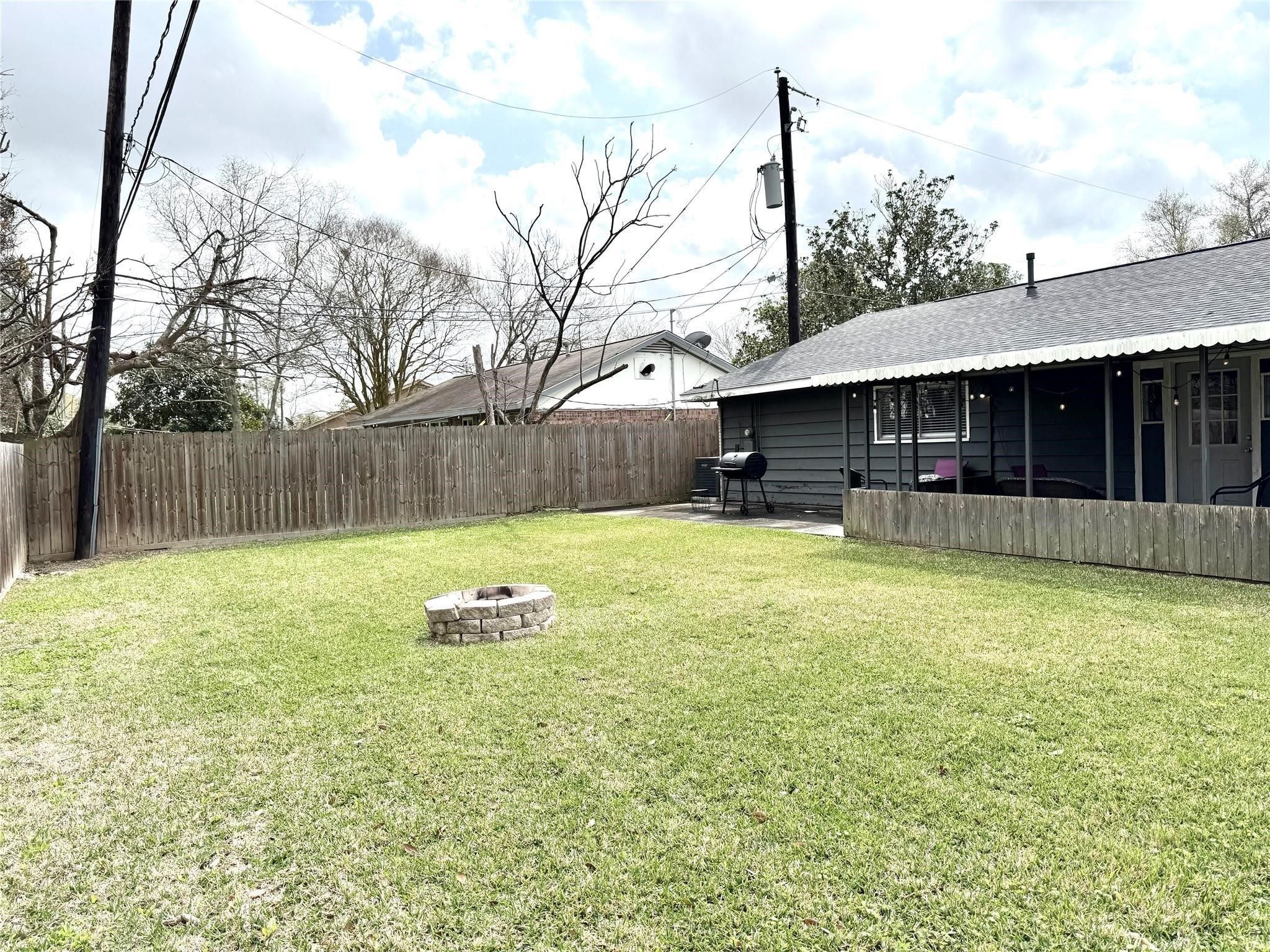 11311 Caribbean Lane Houston, TX 77089 - Photo 20 of 21 a swimming pool with outdoor seating and yard