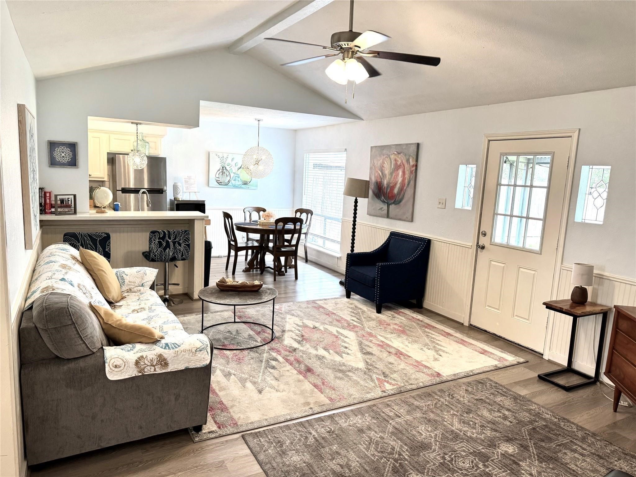 11311 Caribbean Lane Houston, TX 77089 - Photo 4 of 21 a living room with furniture and a flat screen tv