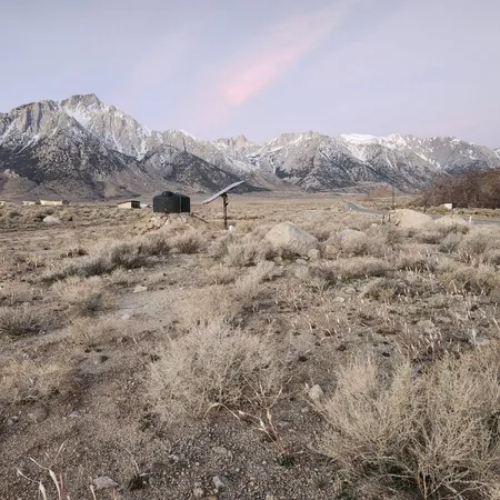 a view of mountain view with trees
