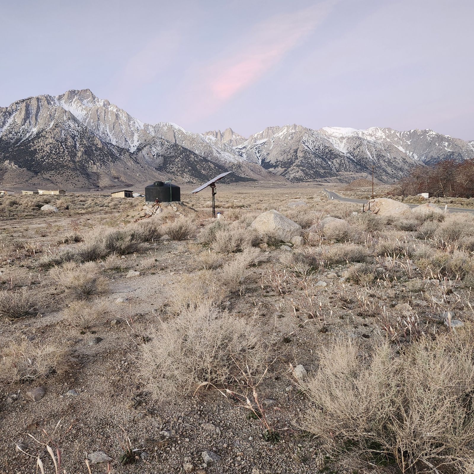 3760 Whitney Portal Road Lone Pine, CA 93545 - Photo 16 of 18 a view of a dry field with mountains in the background