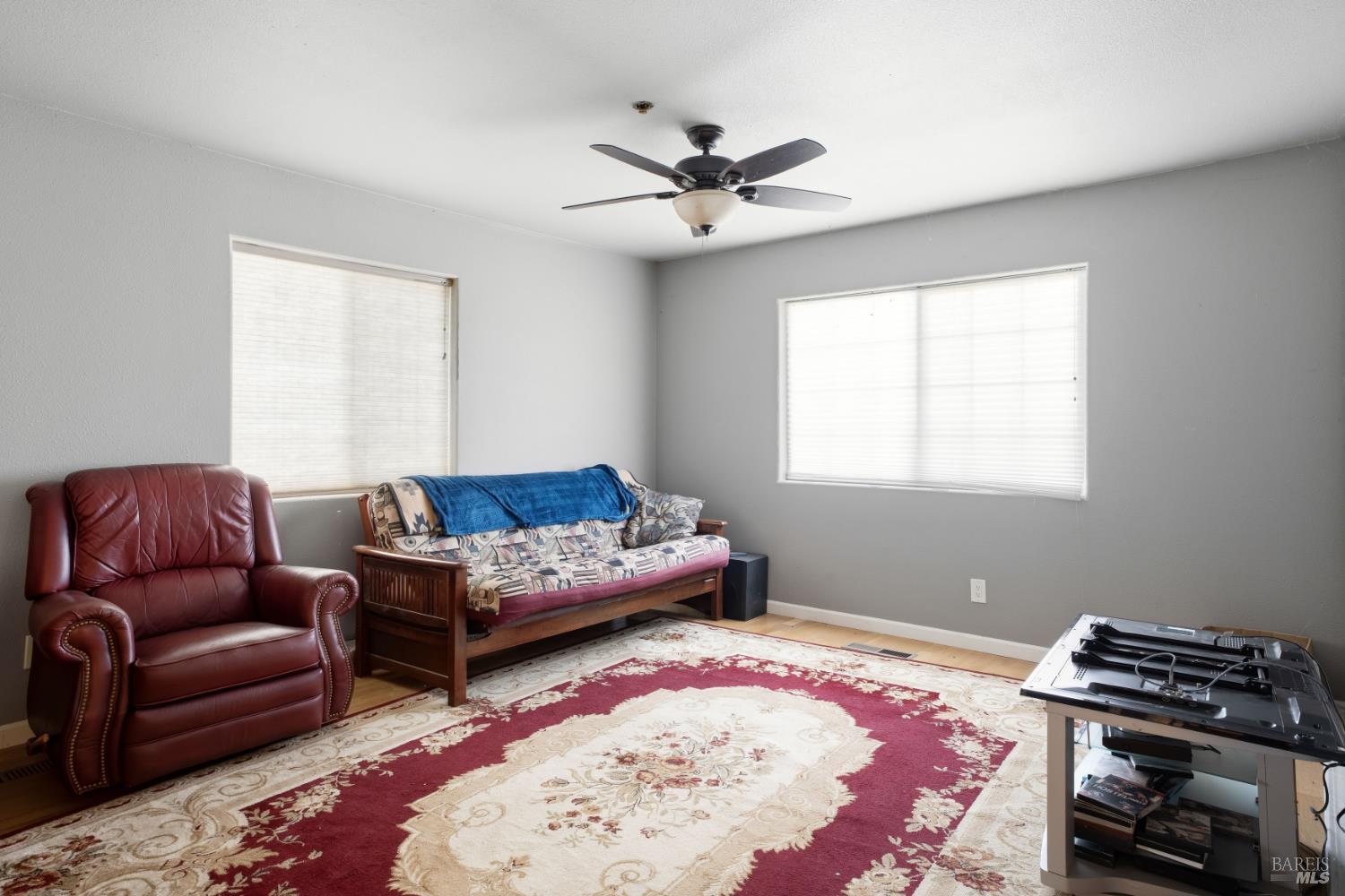 1435 Big Valley Road Lakeport, CA 95453 - Photo 8 of 21 a living room with a bed furniture and a window