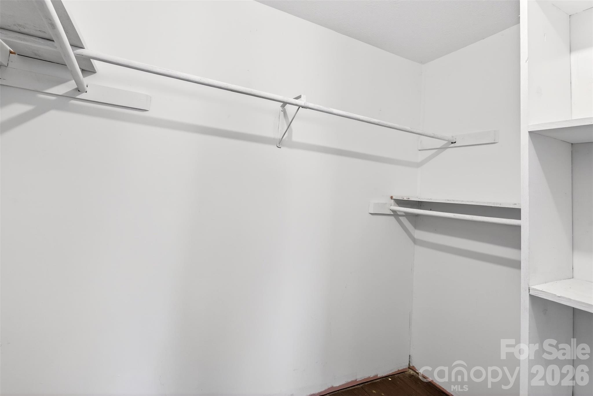 105 Poplar Street Saluda, NC 28773 - Photo 24 of 37 a view of a room with racks on the wall