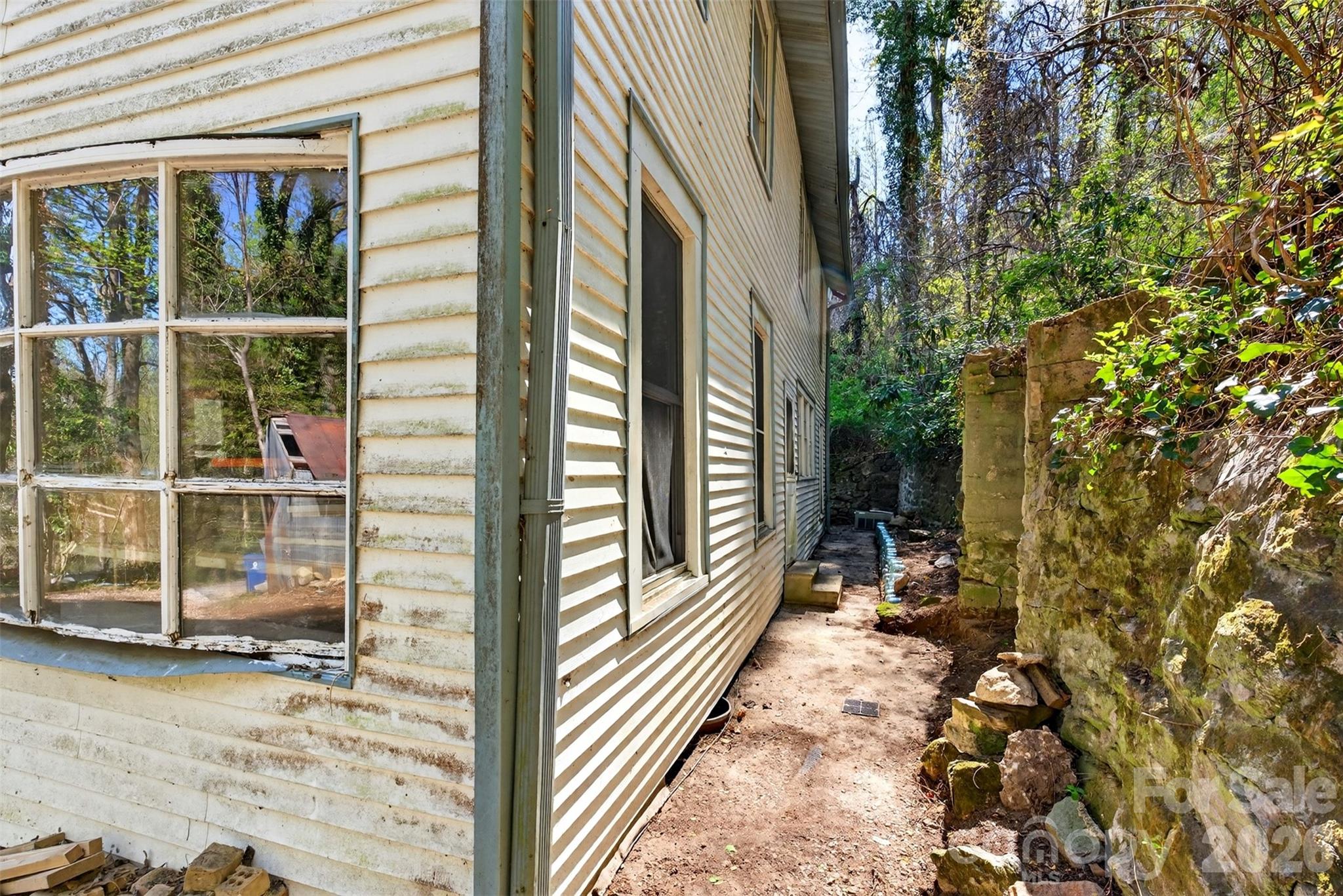 105 Poplar Street Saluda, NC 28773 - Photo 29 of 37 a view of a balcony with a tree
