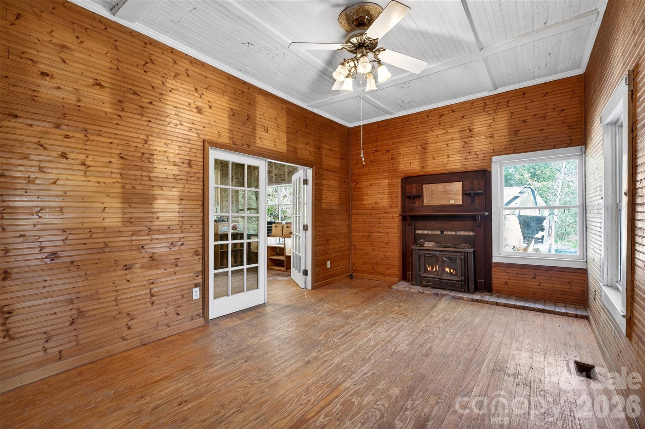 105 Poplar Street Saluda, NC 28773 - Photo 7 of 37 a view of an empty room with a window