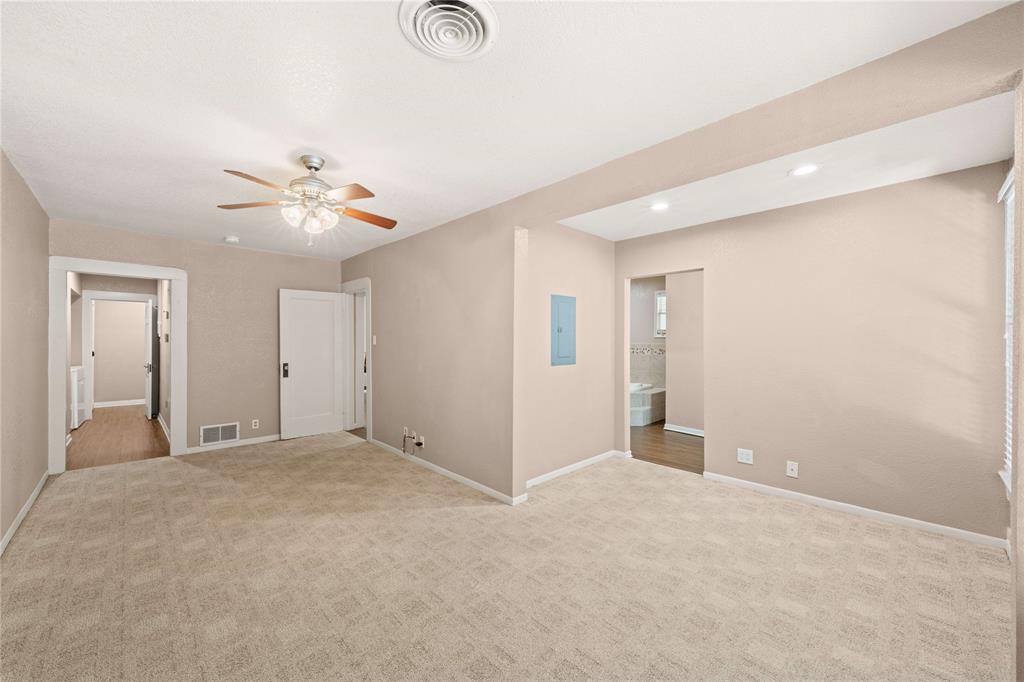 919 North 11th Street Temple, TX 76501 - Photo 16 of 26 a view of an empty room with a fan