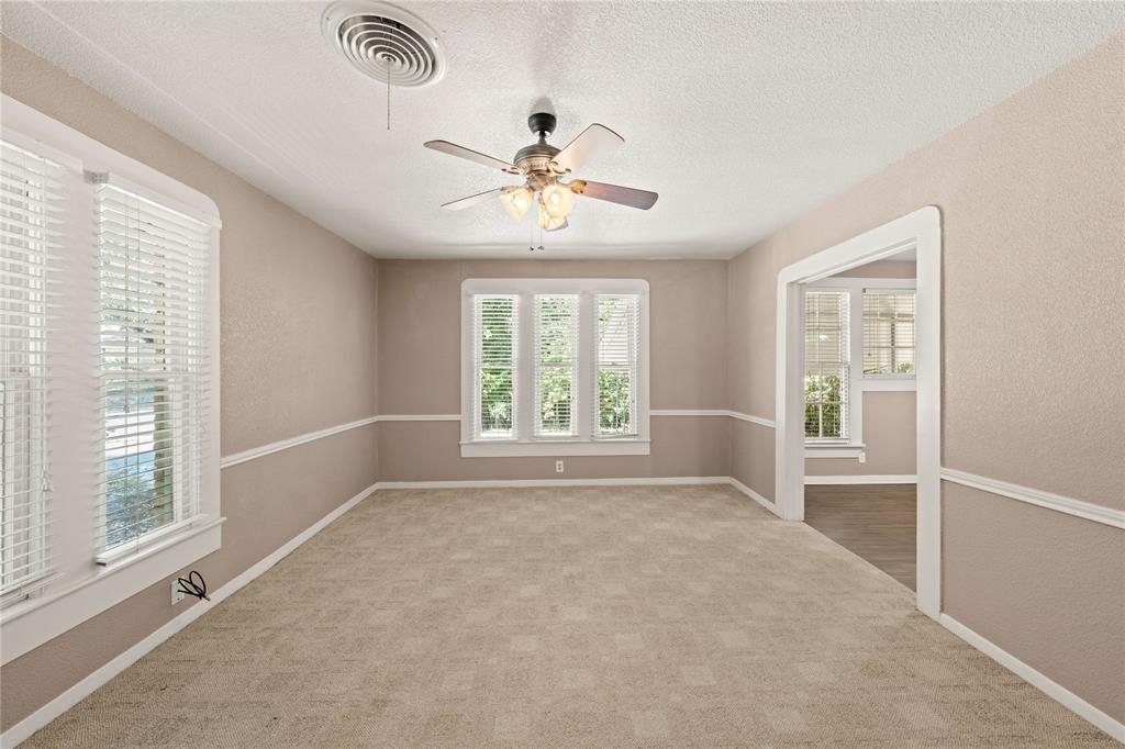 919 North 11th Street Temple, TX 76501 - Photo 5 of 26 a view of room with window and ceiling fan