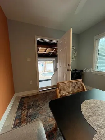 a room with furniture and a window