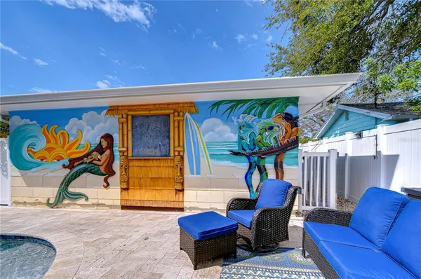 a building outdoor space with patio furniture