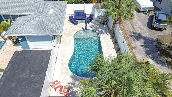 an aerial view of a house with garden