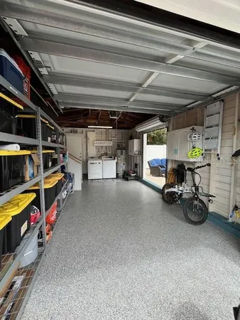 an aerial view of a house having yard patio and swimming pool