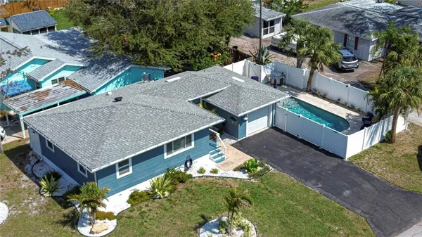an aerial view of a city with lots of residential buildings