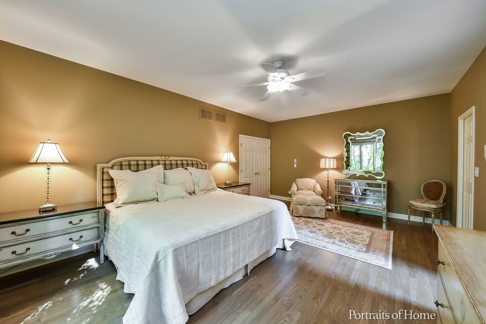 674 East Gartner Road Naperville, IL 60540 - Photo 17 of 36 a bedroom with a bed and wooden floor