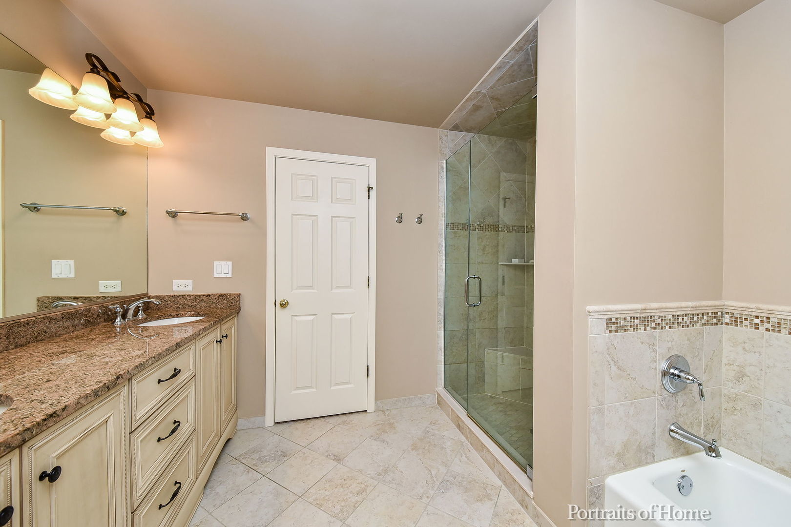674 East Gartner Road Naperville, IL 60540 - Photo 24 of 36 a bathroom with a granite countertop sink a toilet and shower