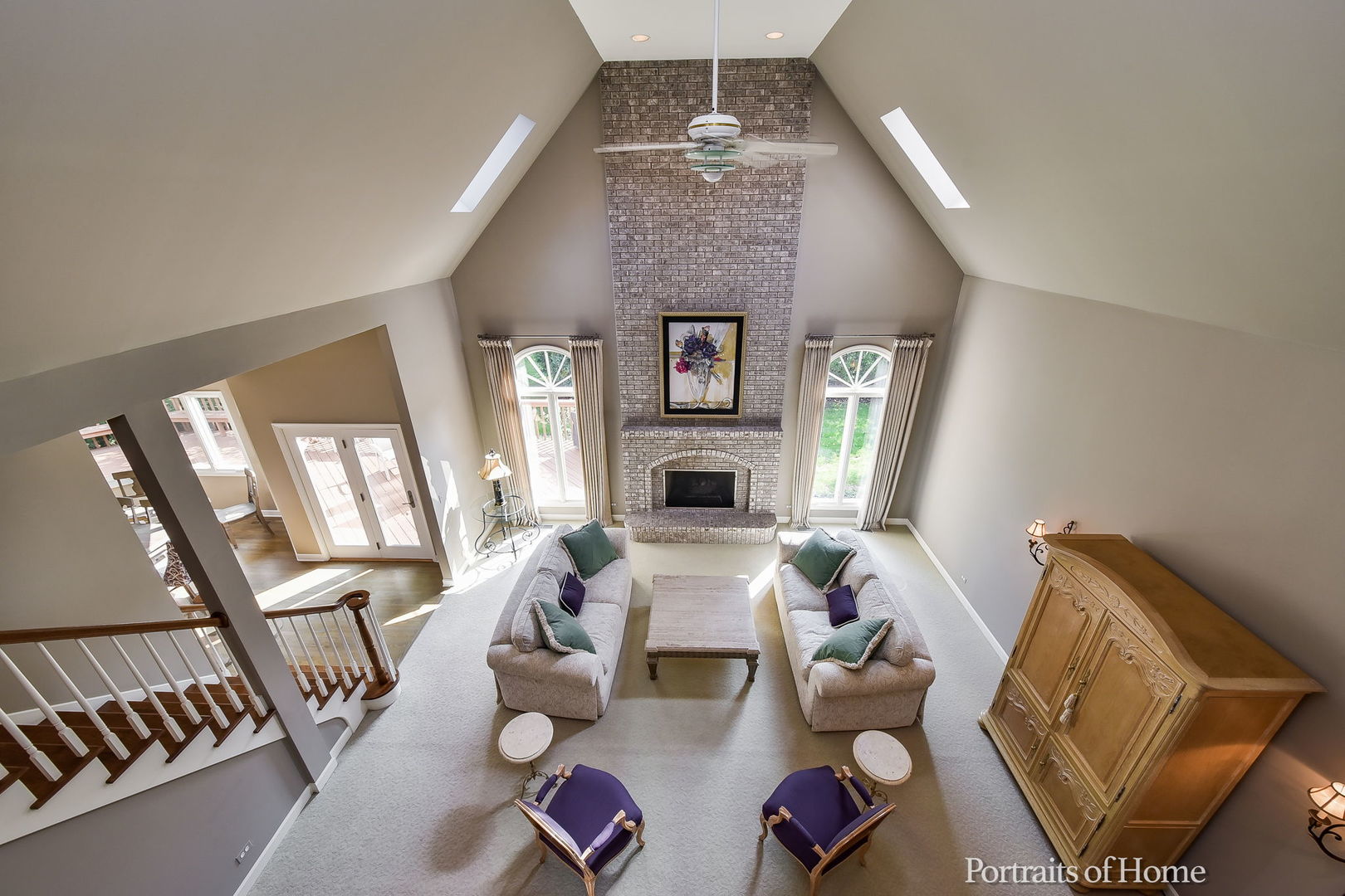 674 East Gartner Road Naperville, IL 60540 - Photo 7 of 36 a living room with furniture and a fireplace