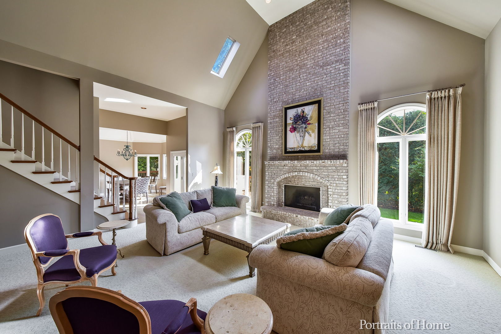 674 East Gartner Road Naperville, IL 60540 - Photo 9 of 36 a living room with furniture a fireplace and a large window