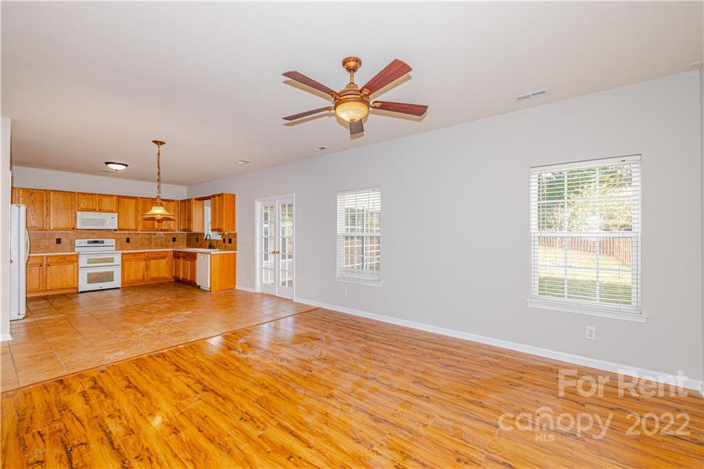 3329 Burnage Hall Road Harrisburg, NC 28075 - Photo 13 of 47 a view of an empty room with a window