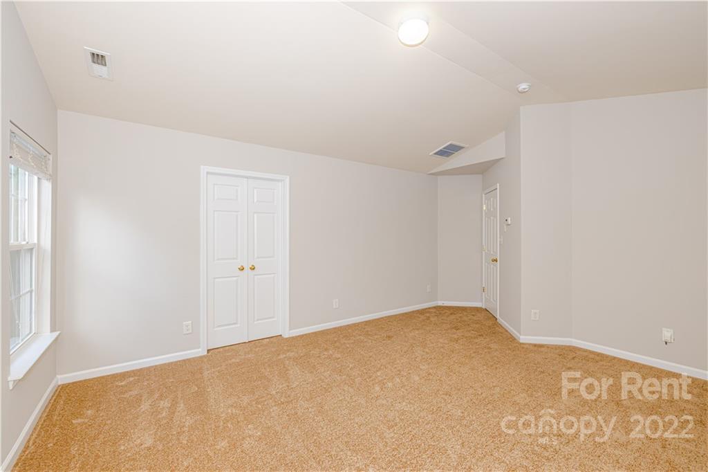 3329 Burnage Hall Road Harrisburg, NC 28075 - Photo 25 of 47 a view of an empty room
