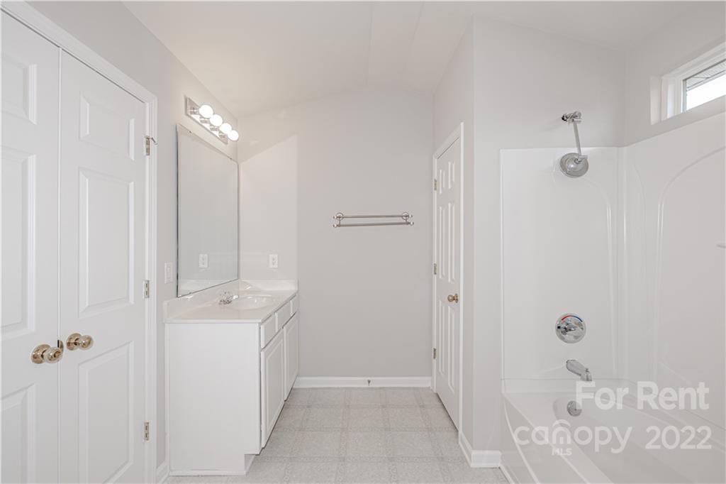 3329 Burnage Hall Road Harrisburg, NC 28075 - Photo 28 of 47 a view of a bathroom with shower
