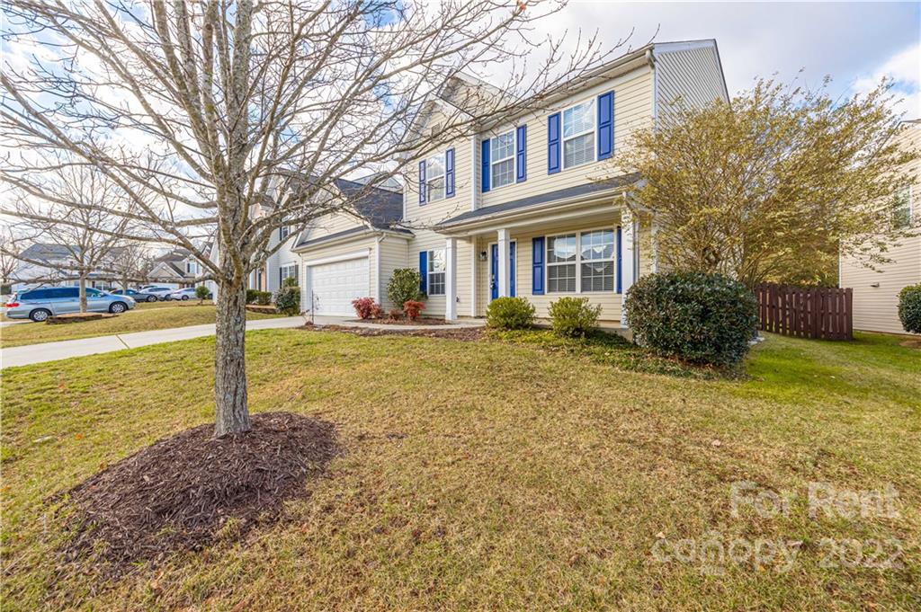 3329 Burnage Hall Road Harrisburg, NC 28075 - Photo 3 of 47 a front view of house with yard and ocean