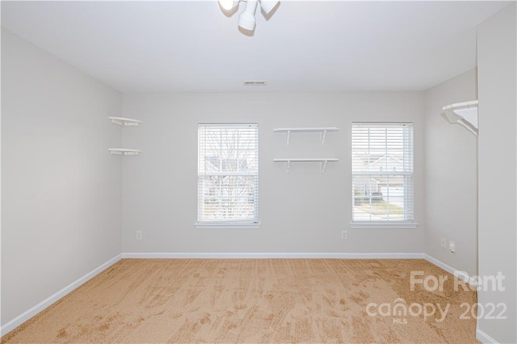 3329 Burnage Hall Road Harrisburg, NC 28075 - Photo 37 of 47 a view of an empty room with a window
