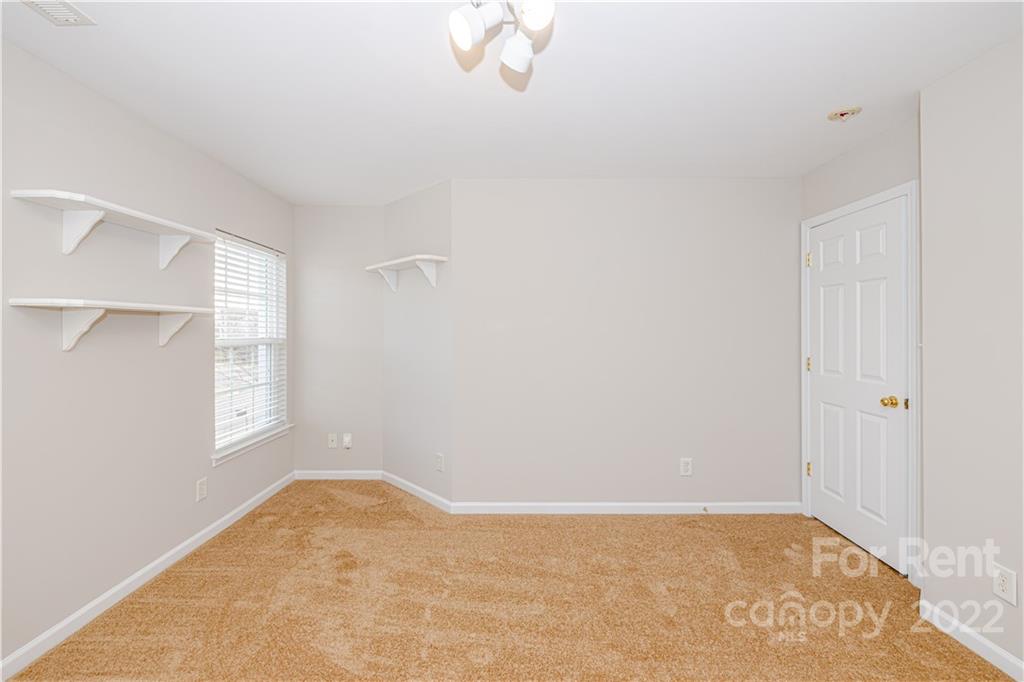 3329 Burnage Hall Road Harrisburg, NC 28075 - Photo 38 of 47 a view of empty room with window