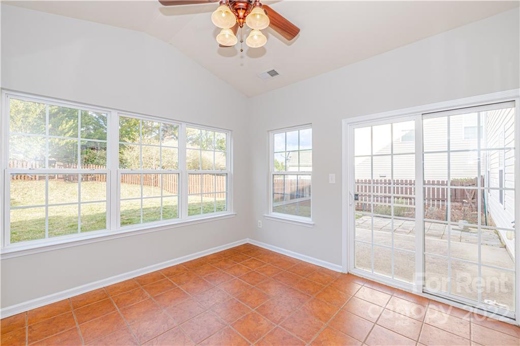 3329 Burnage Hall Road Harrisburg, NC 28075 - Photo 4 of 47 a view of an empty room with a window