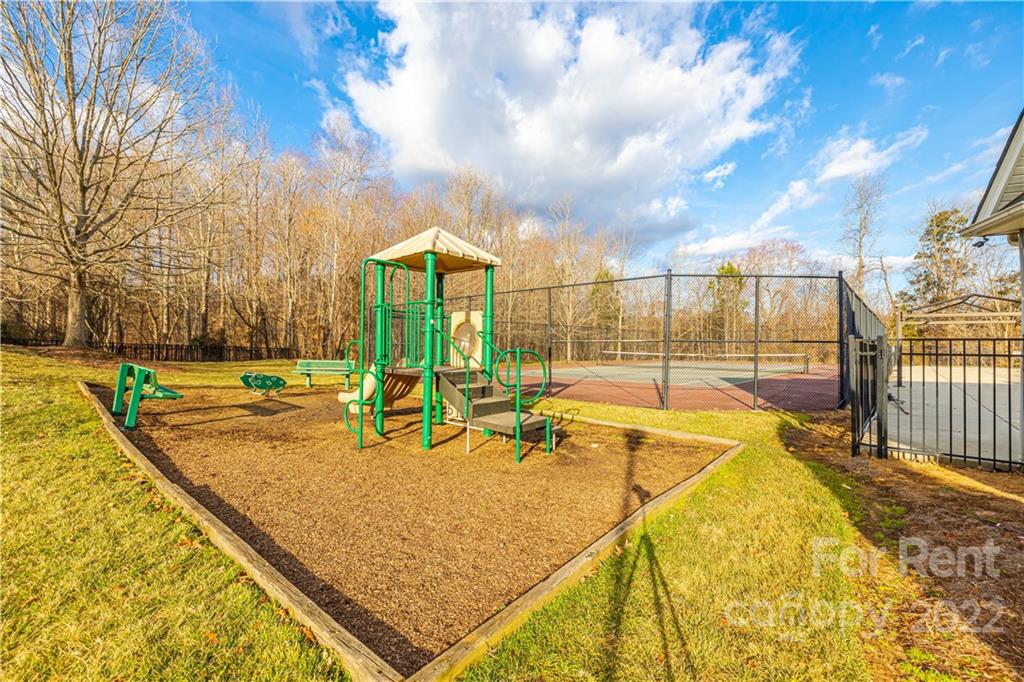3329 Burnage Hall Road Harrisburg, NC 28075 - Photo 47 of 47 a view of a swimming pool with a patio