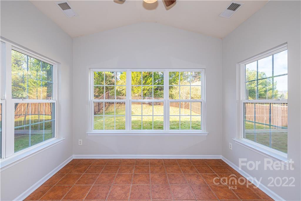3329 Burnage Hall Road Harrisburg, NC 28075 - Photo 5 of 47 a view of an empty room with a window