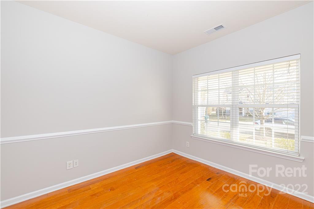 3329 Burnage Hall Road Harrisburg, NC 28075 - Photo 6 of 47 a view of a swimming pool and window