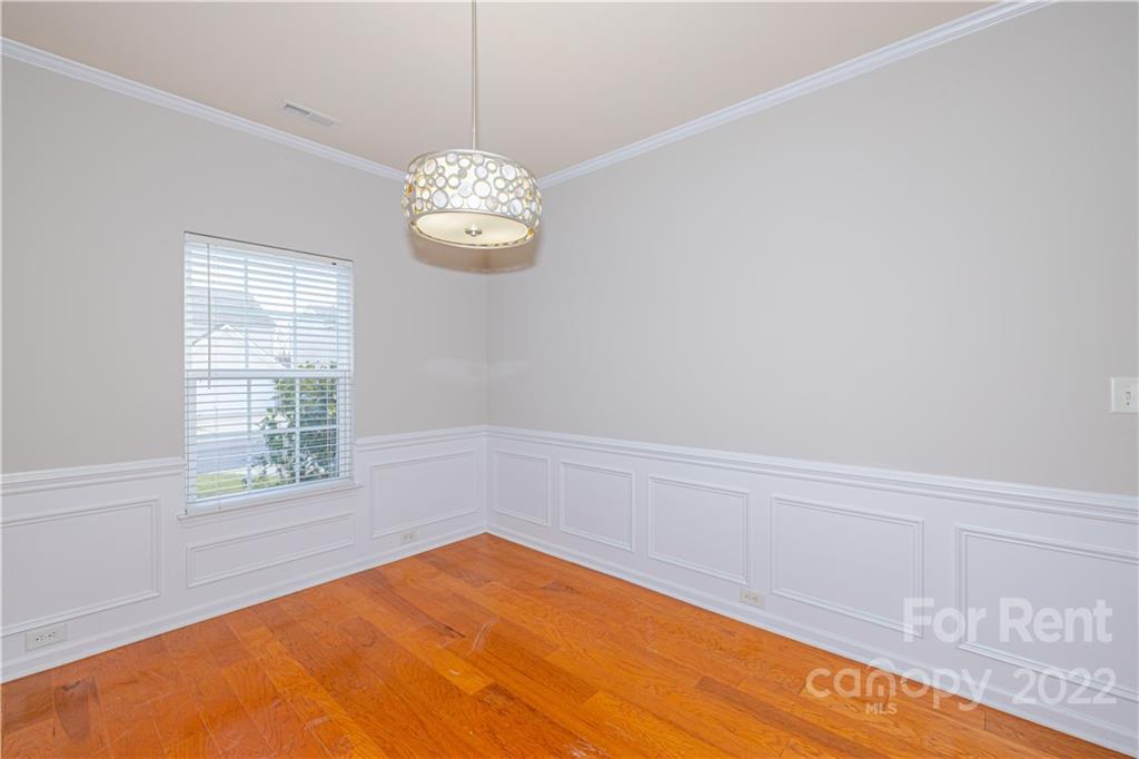 3329 Burnage Hall Road Harrisburg, NC 28075 - Photo 9 of 47 a view of a room with a large window