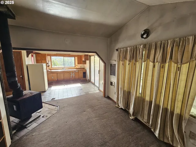 a view of a hallway with a large window