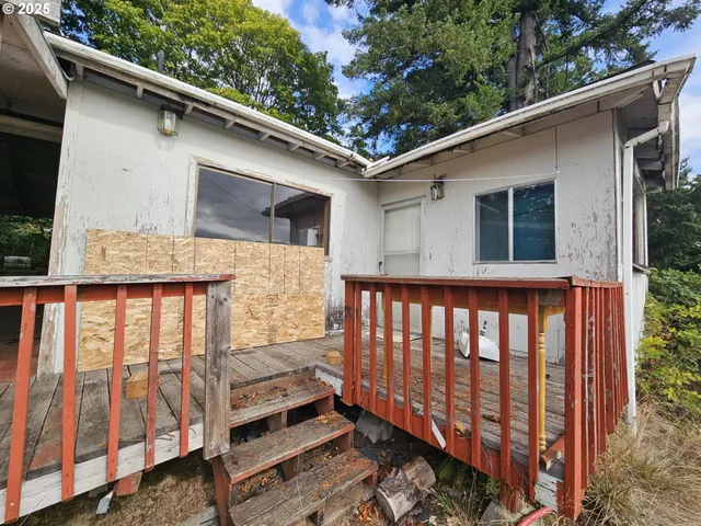 a backyard of a house with a garden