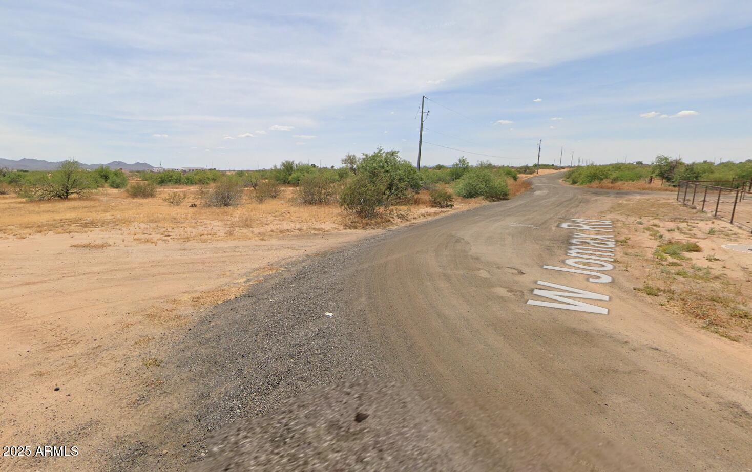 237-x-2 West Jomax Road, Unit 2 Wittmann, AZ 85361 - Photo 8 of 17 W Jomax Rd facing away from property