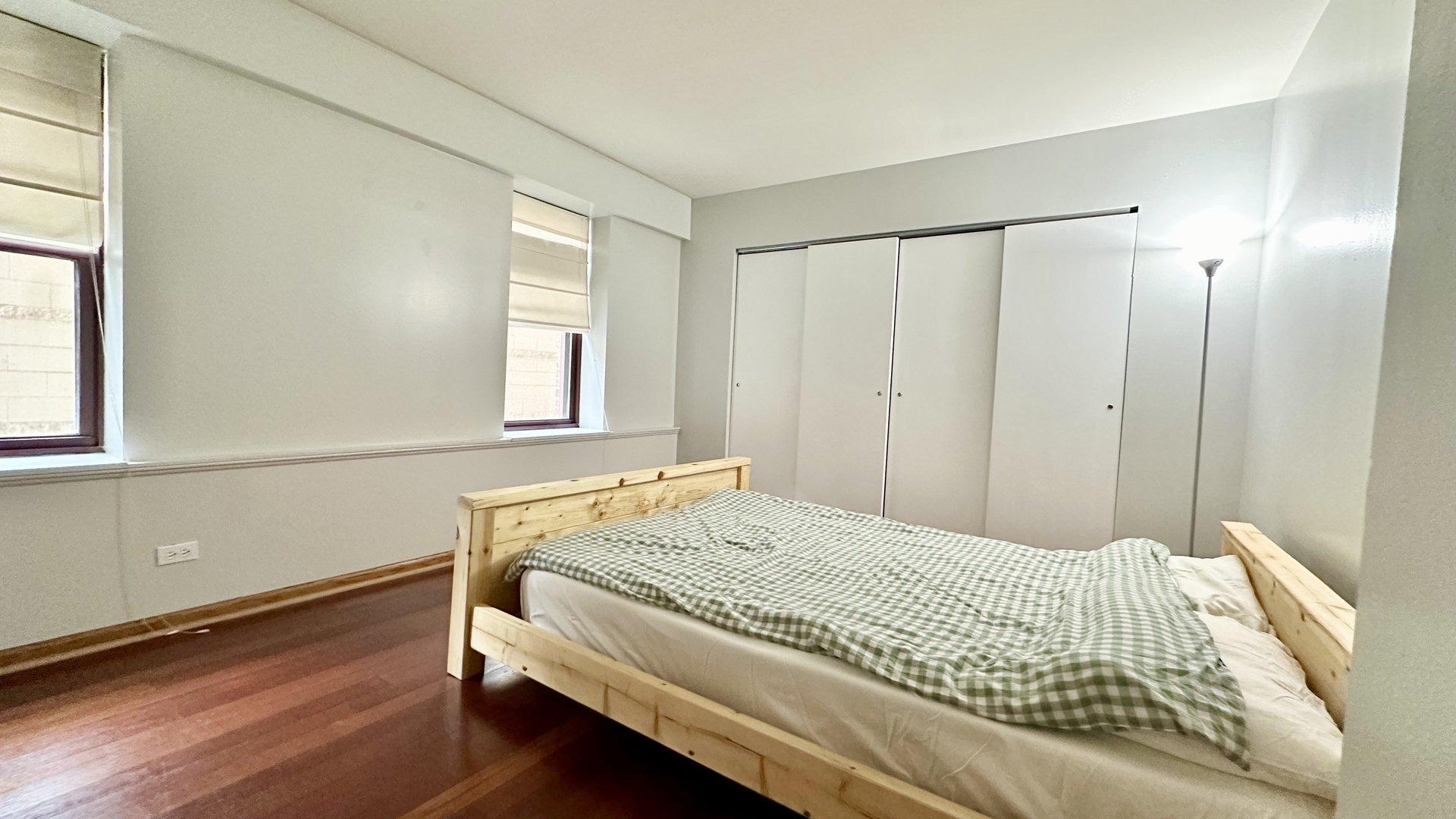 40 East 9th Street, Unit 402 Chicago, IL 60605 - Photo 10 of 24 a bedroom with a bed and a window
