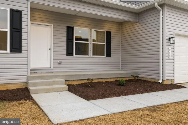 a front view of house with yard