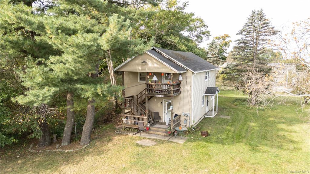 20 Church Street Claverack, NY 12534 - Photo 24 of 28 a view of a house with a yard patio and fire pit