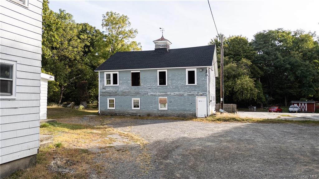 20 Church Street Claverack, NY 12534 - Photo 5 of 28 a front view of a house with a yard