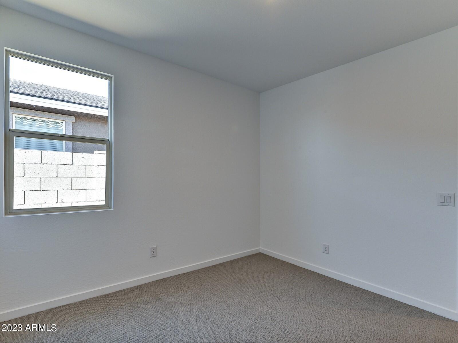 17368 West Red Fox Road Surprise, AZ 85387 - Photo 18 of 26 018_Bedroom