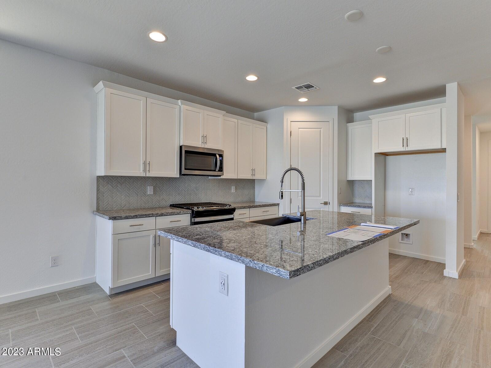 17368 West Red Fox Road Surprise, AZ 85387 - Photo 7 of 26 007_Kitchen