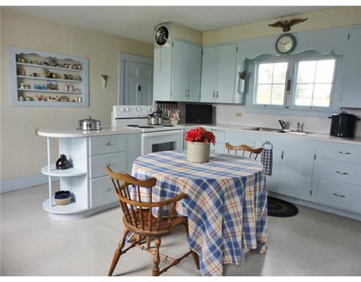 2236 Belfast Road Lincolnville, ME 04849 - Photo 5 of 25 Kitchen. Warm country kitchen with...