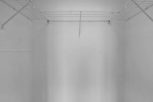 a view of a room with racks on the wall