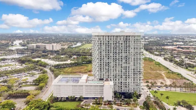 a view of balcony with yard