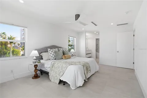 a bathroom with a sink double vanity and a mirror