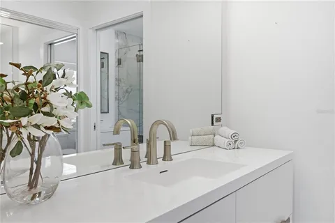 a bathroom with a bathtub and a sink