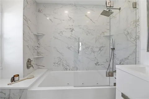 a utility room with sink dryer and washer