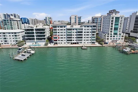 a view of city with tall buildings