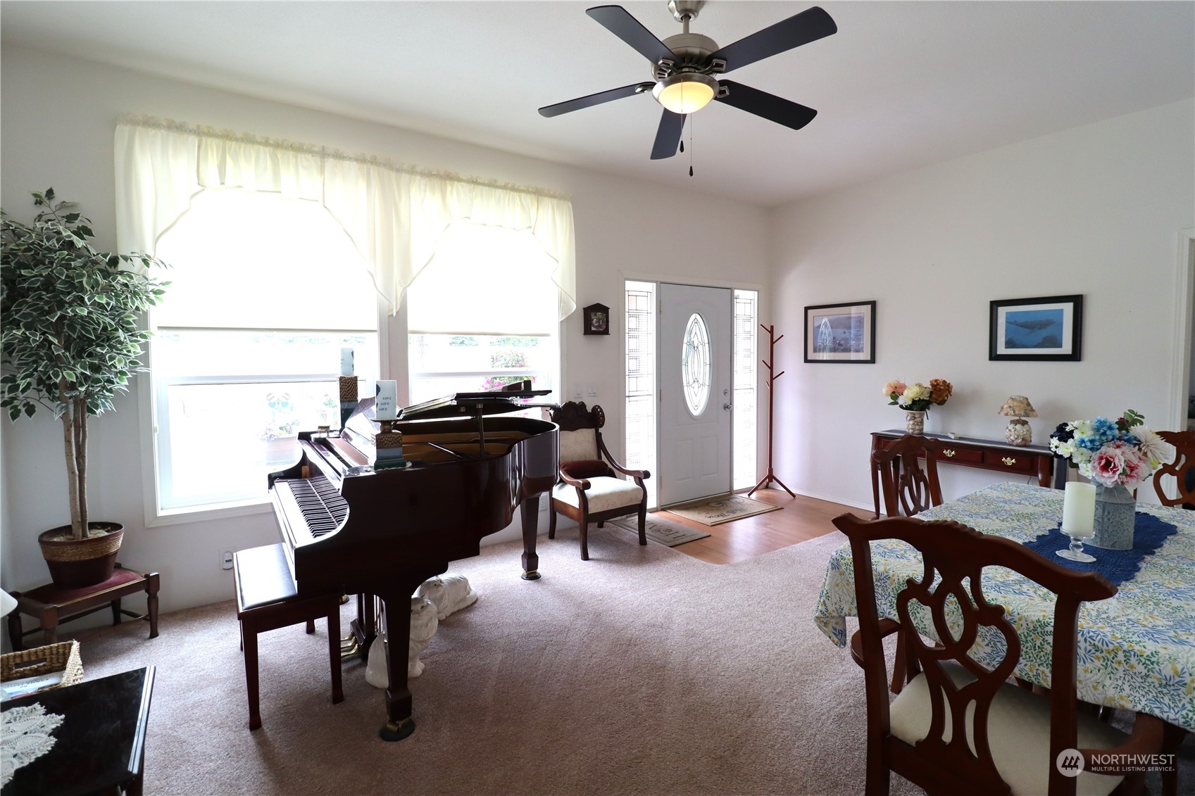 128 Aylesworth Road, Unit 4 Chehalis, WA 98532 - Photo 13 of 24 a living room with furniture or couch and a large window